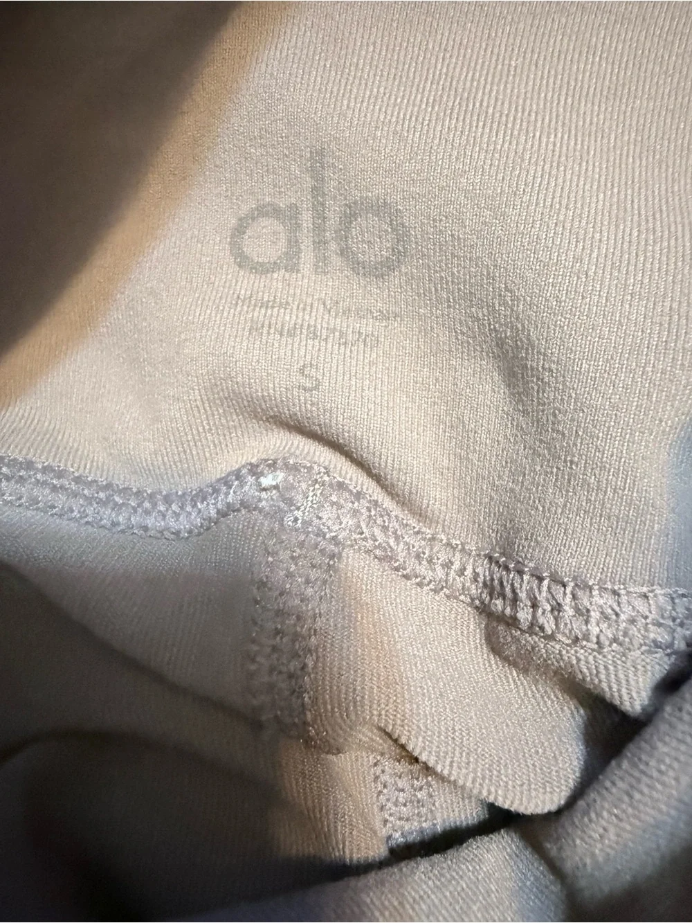 ALO Yoga High-Rise moto Leggings in Light Taupe